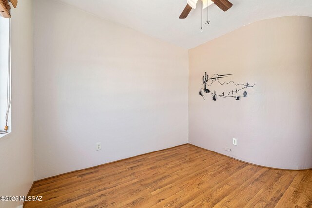 1525 N Bryant Ave, Tucson, AZ 85712 - empty room featuring light wood-style floors, ceiling fan, and lofted ceiling