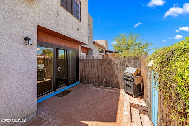 1525 N Bryant Ave, Tucson, AZ 85712 - view of patio featuring fence and area for grilling