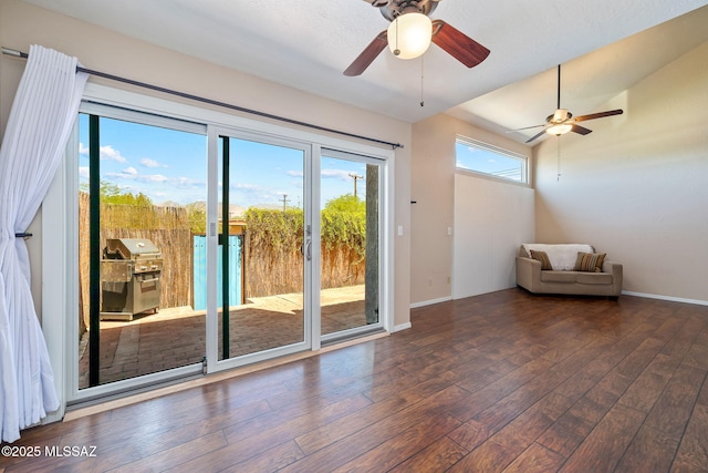1525 N Bryant Ave, Tucson, AZ 85712 - entryway with a ceiling fan, baseboards, and hardwood / wood-style flooring
