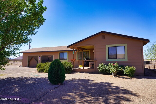 ranch-style home featuring an attached garage