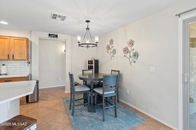 11042 W Case Way, Marana, AZ 85653 - dining space featuring a chandelier, light tile patterned floors, baseboards, and recessed lighting