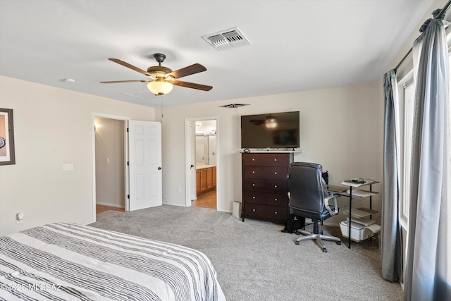 11042 W Case Way, Marana, AZ 85653 - bedroom with light carpet, an office area, ceiling fan, and ensuite bath