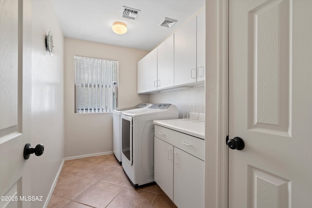 11042 W Case Way, Marana, AZ 85653 - washroom featuring separate washer and dryer, cabinet space, baseboards, and light tile patterned floors
