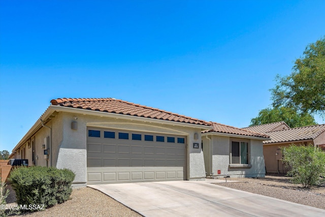 11042 W Case Way, Marana, AZ 85653 - mediterranean / spanish-style home featuring an attached garage, stucco siding, concrete driveway, and a tile roof