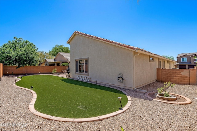 11042 W Case Way, Marana, AZ 85653 - fenced backyard with a putting area