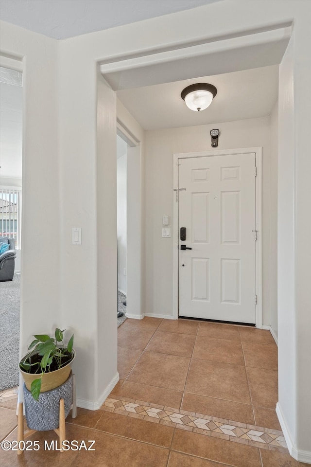 11042 W Case Way, Marana, AZ 85653 - entryway with light tile patterned floors and baseboards