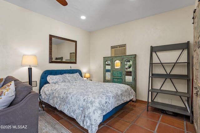 bedroom with dark tile patterned floors, a ceiling fan, and recessed lighting