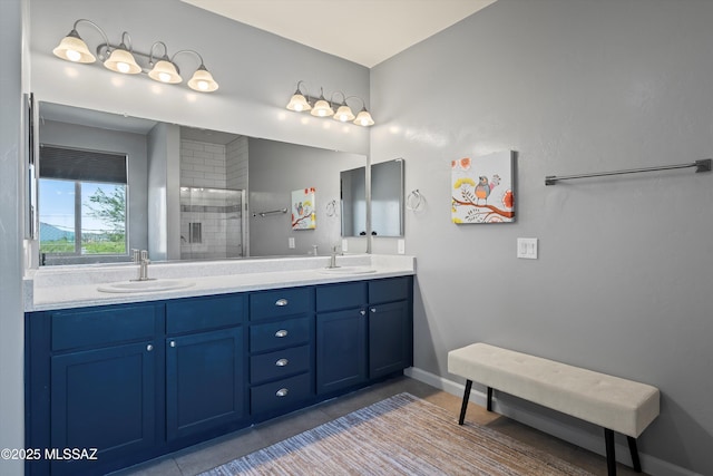 2868 N Silkie Pl, Tucson, AZ 85719 - bathroom featuring double vanity, a sink, tile patterned floors, and tiled shower