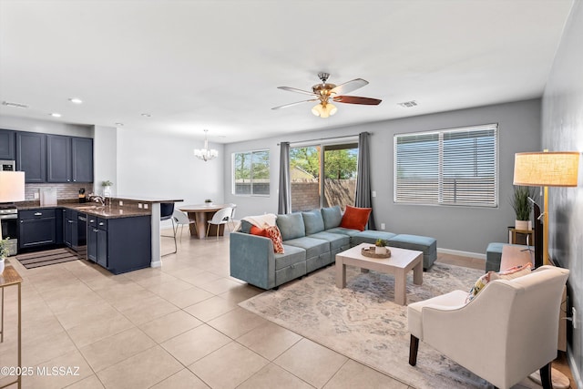 2868 N Silkie Pl, Tucson, AZ 85719 - living area with recessed lighting, visible vents, light tile patterned floors, and ceiling fan with notable chandelier