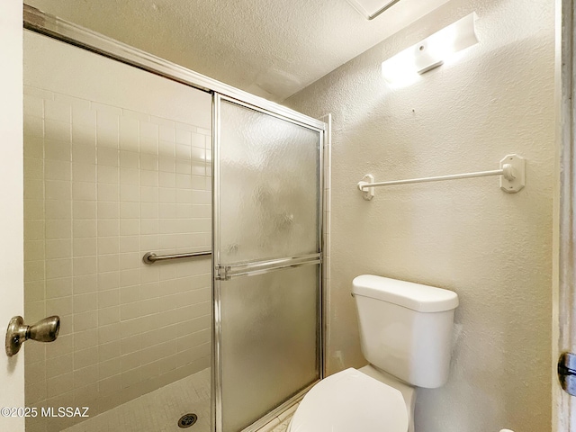 10084 E Bryonwood Ln, Tucson, AZ 85730 - full bathroom with a tile shower, a textured ceiling, and a textured wall