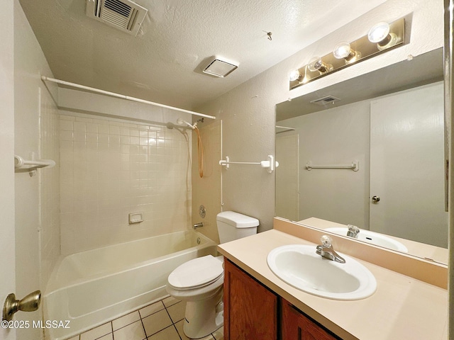 10084 E Bryonwood Ln, Tucson, AZ 85730 - bathroom featuring bathtub / shower combination, tile patterned floors, vanity, and a textured ceiling