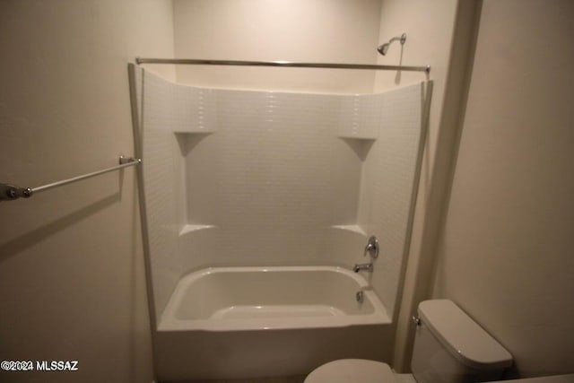 full bathroom featuring bathtub / shower combination and toilet
