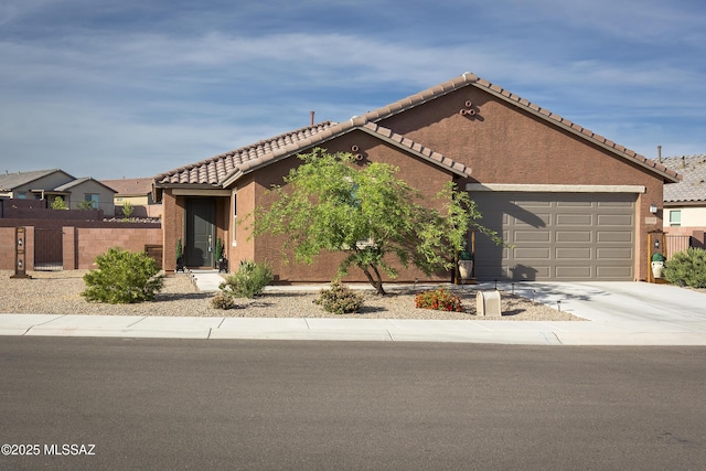 single story home with fence, a tile roof, a garage, stucco siding, and driveway