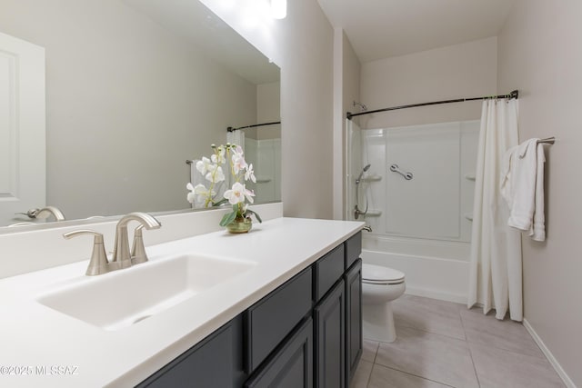 bathroom featuring shower / bath combination with curtain, tile patterned flooring, vanity, baseboards, and toilet