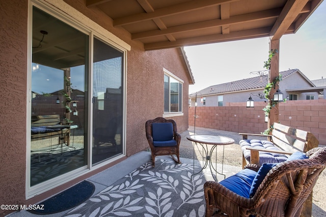view of patio / terrace with fence