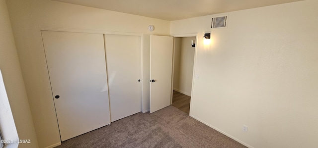 2801 W Calle De Rosita, Tucson, AZ 85746 - unfurnished bedroom with a closet and carpet flooring