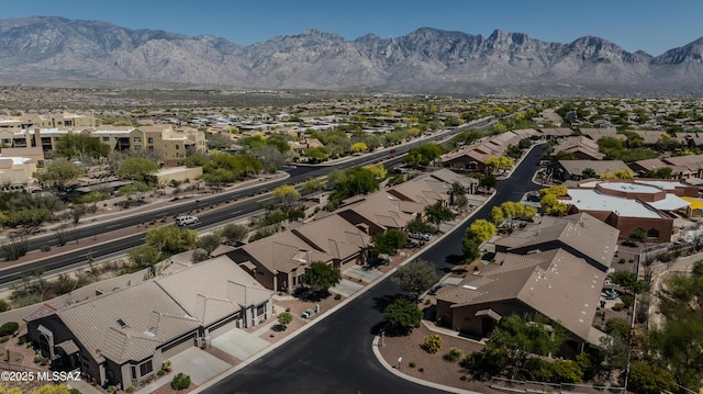 birds eye view of property featuring a mountain view and a residential view
