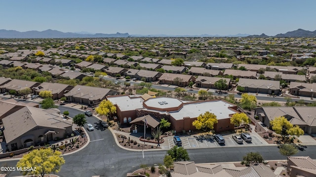 birds eye view of property featuring a mountain view and a residential view