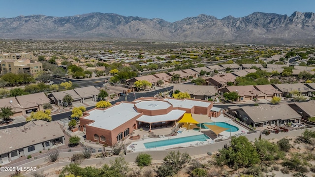 drone / aerial view with a residential view and a mountain view