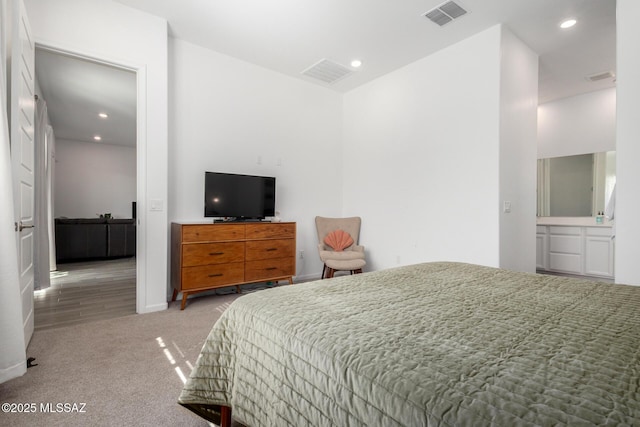 bedroom with carpet flooring and recessed lighting