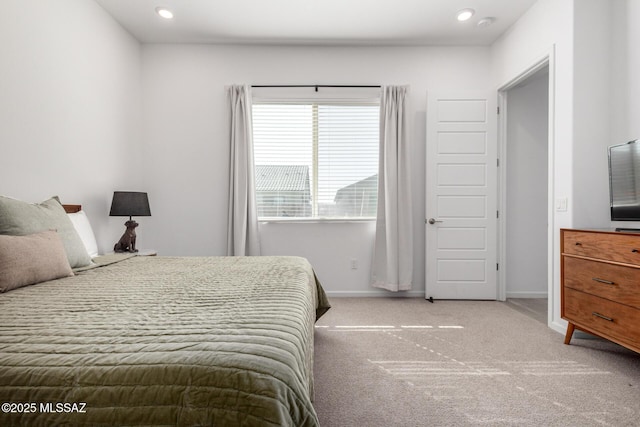 carpeted bedroom with baseboards and recessed lighting