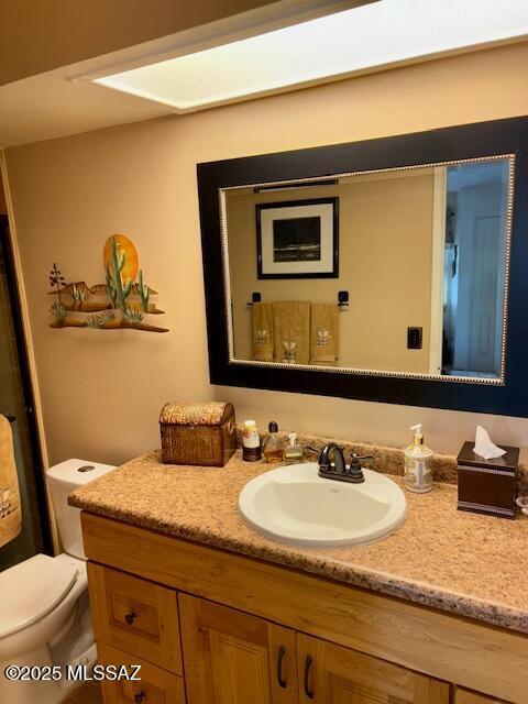 215 E Los Rincones, Green Valley, AZ 85614 - bathroom with toilet and vanity