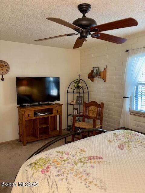 215 E Los Rincones, Green Valley, AZ 85614 - carpeted bedroom with a ceiling fan and a textured ceiling