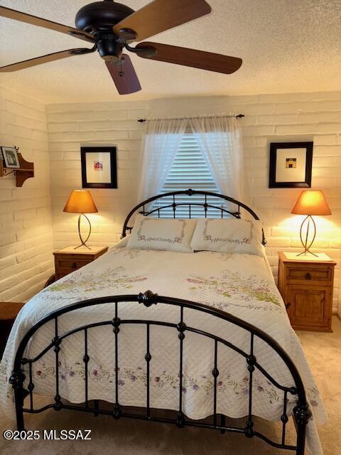 215 E Los Rincones, Green Valley, AZ 85614 - bedroom featuring carpet flooring and a textured ceiling
