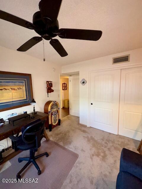 215 E Los Rincones, Green Valley, AZ 85614 - office with carpet floors, ceiling fan, and visible vents