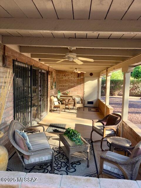 215 E Los Rincones, Green Valley, AZ 85614 - view of patio featuring a ceiling fan