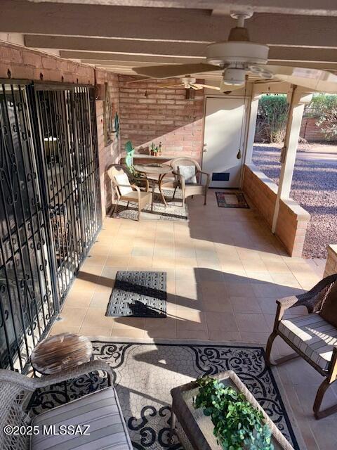 215 E Los Rincones, Green Valley, AZ 85614 - view of patio featuring ceiling fan