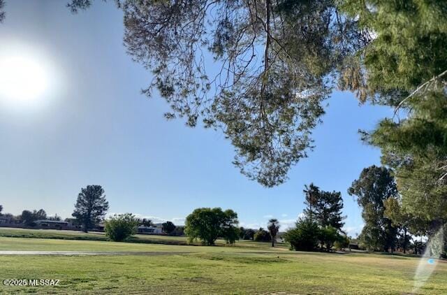 215 E Los Rincones, Green Valley, AZ 85614 - view of home's community featuring a lawn