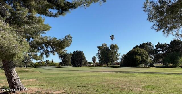 215 E Los Rincones, Green Valley, AZ 85614 - surrounding community with a lawn and view of golf course