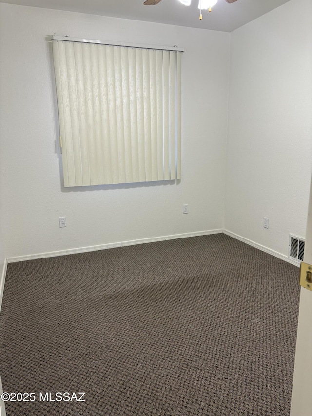 829 E Calle Esplendor, Nogales, AZ 85621 - spare room featuring baseboards, ceiling fan, carpet floors, and visible vents
