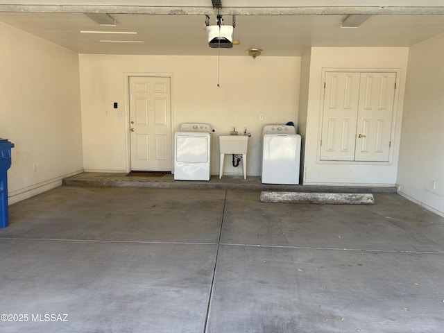 829 E Calle Esplendor, Nogales, AZ 85621 - garage featuring a sink, a garage door opener, and washer and dryer