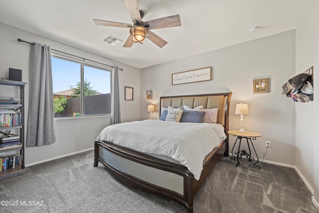 bedroom with carpet floors, baseboards, and visible vents