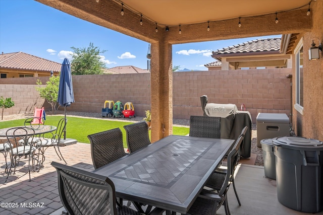 view of patio / terrace with fence and outdoor dining space
