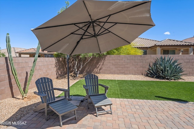 view of patio / terrace featuring a fenced backyard
