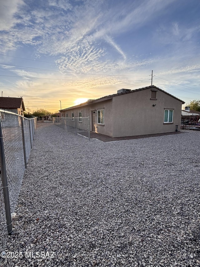 3649 S Belmar Ave, Tucson, AZ 85713 - view of side of property featuring a fenced backyard and stucco siding