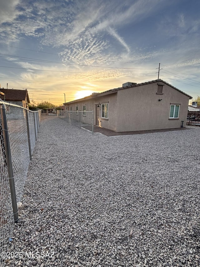 3649 S Belmar Ave, Tucson, AZ 85713 - view of home's exterior with a fenced backyard and stucco siding