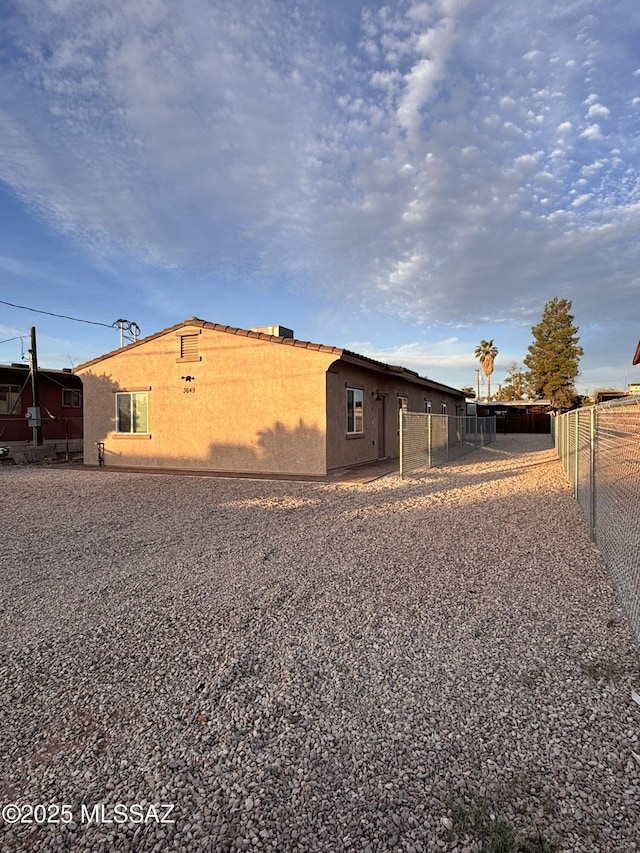 3649 S Belmar Ave, Tucson, AZ 85713 - view of side of home with fence and stucco siding