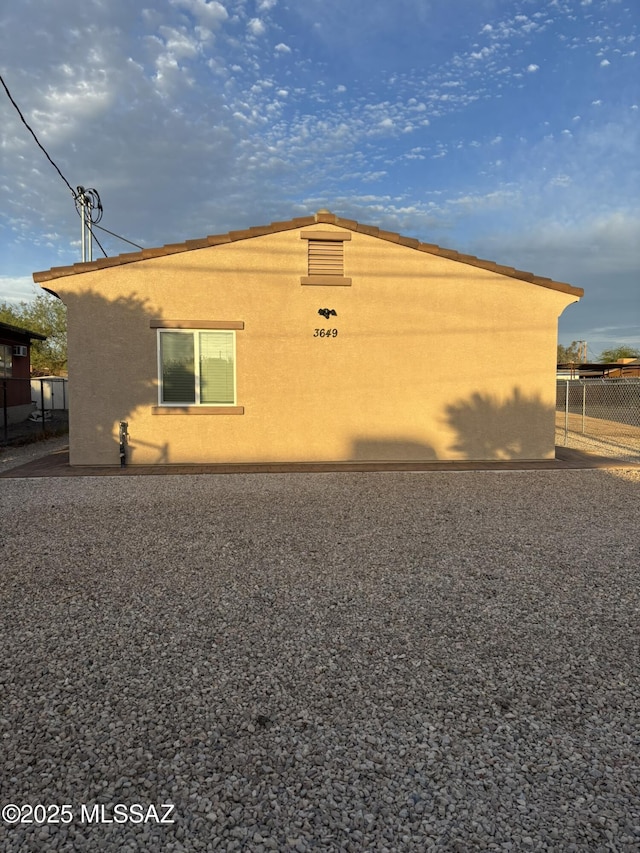 3649 S Belmar Ave, Tucson, AZ 85713 - view of property exterior with fence and stucco siding