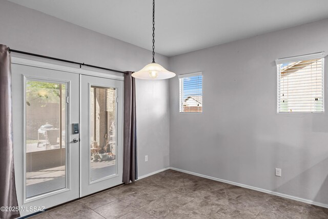 1020 E Wiley Squirrel Ln, Sahuarita, AZ 85629 - unfurnished dining area with baseboards and tile patterned floors