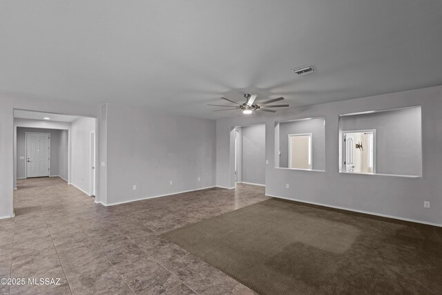 1020 E Wiley Squirrel Ln, Sahuarita, AZ 85629 - unfurnished living room with visible vents, recessed lighting, baseboards, and ceiling fan