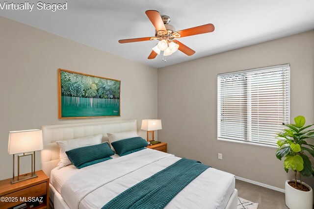 1020 E Wiley Squirrel Ln, Sahuarita, AZ 85629 - carpeted bedroom featuring baseboards and ceiling fan