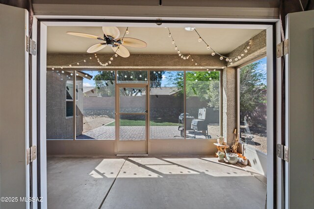 1020 E Wiley Squirrel Ln, Sahuarita, AZ 85629 - unfurnished sunroom featuring a ceiling fan