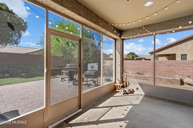1020 E Wiley Squirrel Ln, Sahuarita, AZ 85629 - unfurnished sunroom featuring a wealth of natural light
