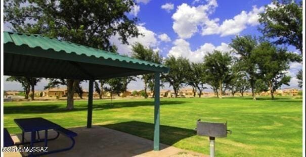 1020 E Wiley Squirrel Ln, Sahuarita, AZ 85629 - surrounding community with a lawn and a gazebo