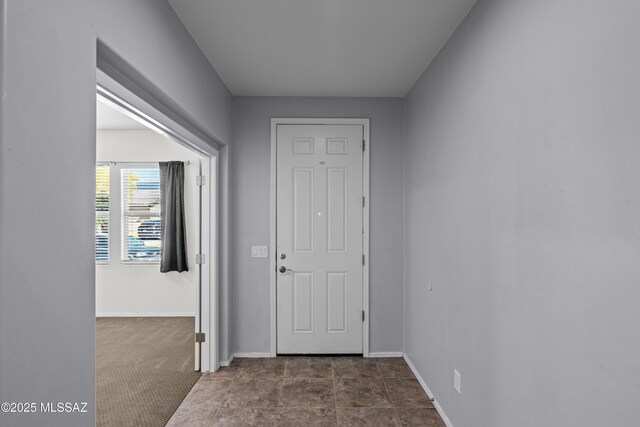 1020 E Wiley Squirrel Ln, Sahuarita, AZ 85629 - doorway to outside with baseboards
