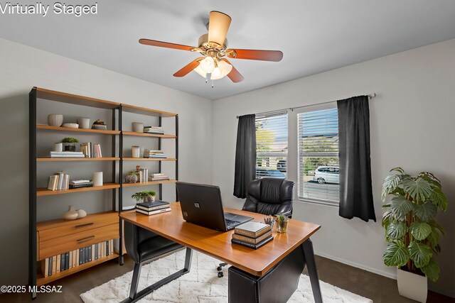 1020 E Wiley Squirrel Ln, Sahuarita, AZ 85629 - home office featuring baseboards, ceiling fan, and carpet floors